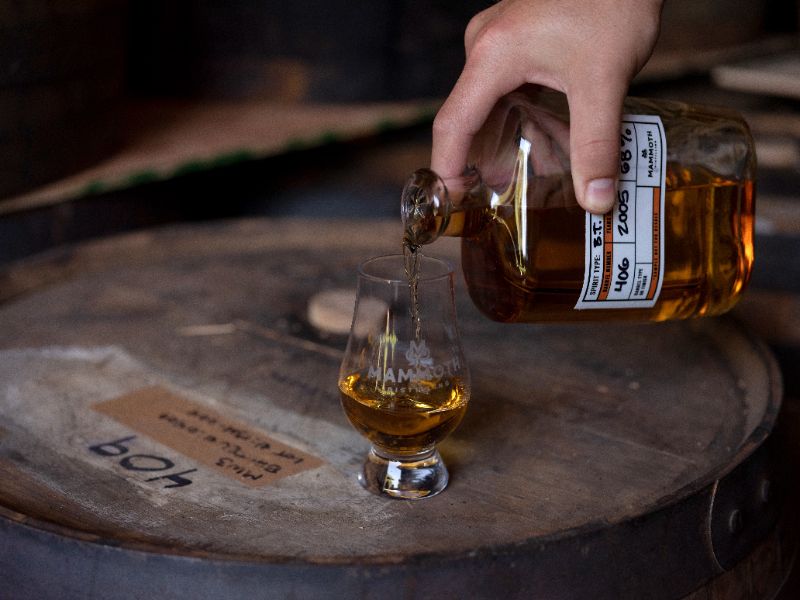 Whiskey poured at a working distillery.